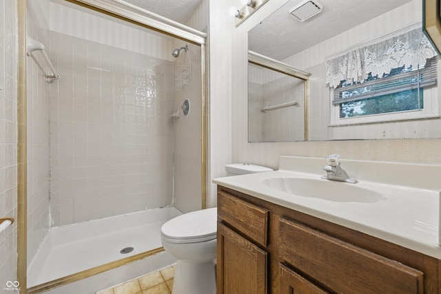 1826 Shorter Dr, Indianapolis, IN 46214 - full bathroom featuring toilet, a shower stall, vanity, tile patterned flooring, and a textured ceiling