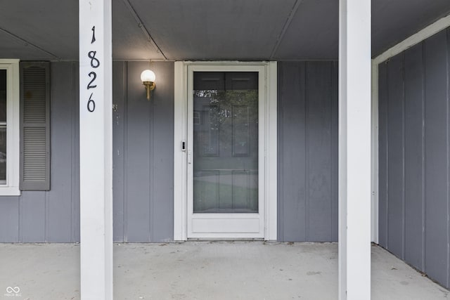 1826 Shorter Dr, Indianapolis, IN 46214 - doorway to property with board and batten siding