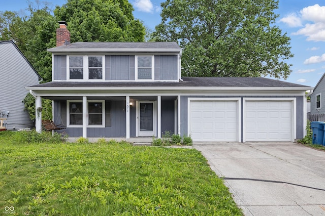 1826 Shorter Dr, Indianapolis, IN 46214 - view of front of home featuring an attached garage, a chimney, concrete driveway, covered porch, and a front lawn