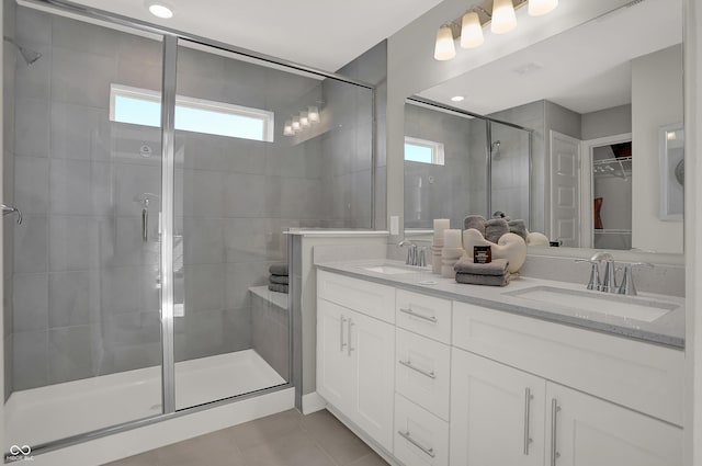 6702 Halsey St, Zionsville, IN 46077 - full bathroom featuring a shower stall, tile patterned flooring, double vanity, and a walk in closet