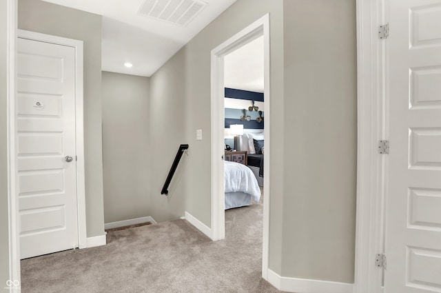 6702 Halsey St, Zionsville, IN 46077 - hall with an upstairs landing, carpet flooring, and baseboards