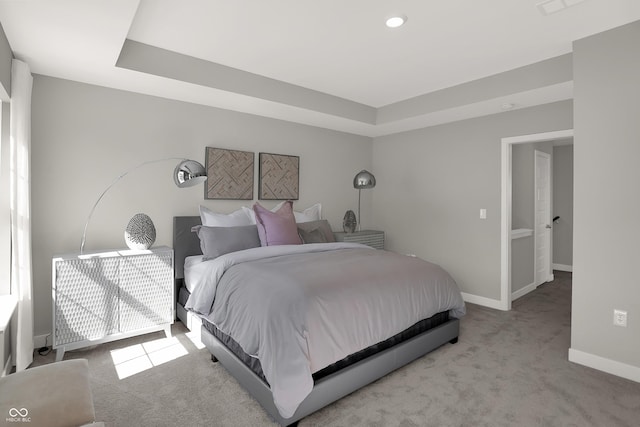 6702 Halsey St, Zionsville, IN 46077 - carpeted bedroom with baseboards, a tray ceiling, and recessed lighting