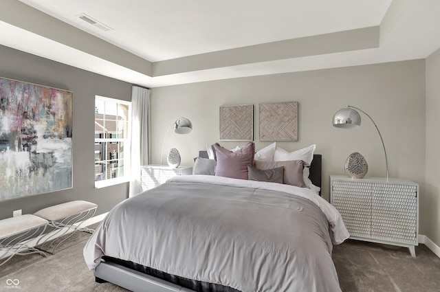 6702 Halsey St, Zionsville, IN 46077 - carpeted bedroom featuring a raised ceiling and baseboards