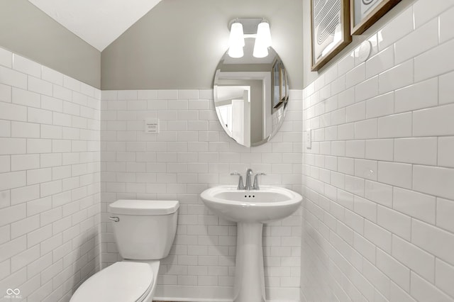 6702 Halsey St, Zionsville, IN 46077 - half bathroom featuring tile walls and toilet