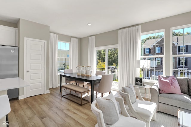 6702 Halsey St, Zionsville, IN 46077 - dining space featuring light wood-style floors, healthy amount of natural light, and recessed lighting