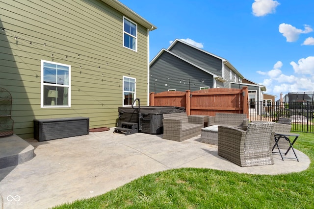 13485 Mancroft Dr, Fishers, IN 46037 - back of property featuring a hot tub and a patio area