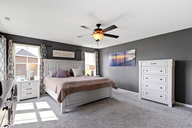 13485 Mancroft Dr, Fishers, IN 46037 - bedroom with light carpet, baseboards, and a ceiling fan