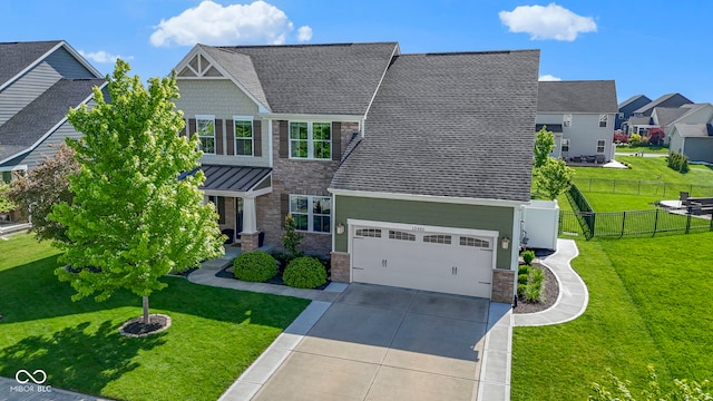 13485 Mancroft Dr, Fishers, IN 46037 - craftsman house with stone siding, driveway, a garage, a residential view, and roof with shingles