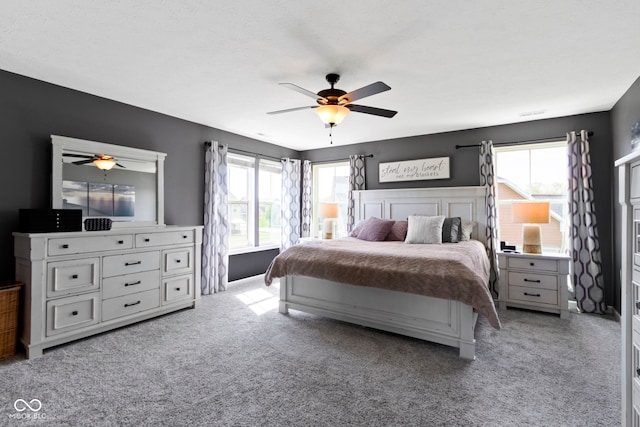13485 Mancroft Dr, Fishers, IN 46037 - carpeted bedroom featuring multiple windows and ceiling fan