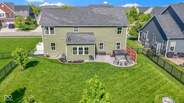 13485 Mancroft Dr, Fishers, IN 46037 - back of property featuring a patio area, a residential view, roof with shingles, and central AC