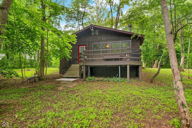 2781 E Vandalia Rd, Flat Rock, IN 47234 - rear view of house with a wooden deck and stairs