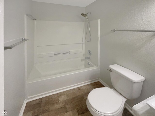15110 Fawn Hollow Ln, Noblesville, IN 46060 - full bathroom featuring toilet, shower / bath combination, and baseboards