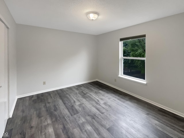 15110 Fawn Hollow Ln, Noblesville, IN 46060 - unfurnished room with dark wood-style flooring and baseboards