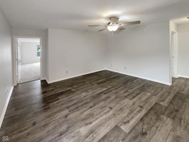 15110 Fawn Hollow Ln, Noblesville, IN 46060 - unfurnished room with a ceiling fan, dark wood-style floors, and baseboards