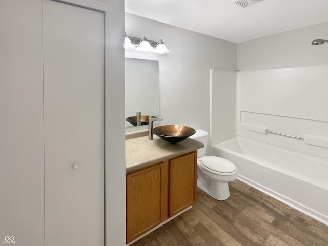 15110 Fawn Hollow Ln, Noblesville, IN 46060 - full bathroom featuring wood finished floors, vanity, toilet, and tub / shower combination
