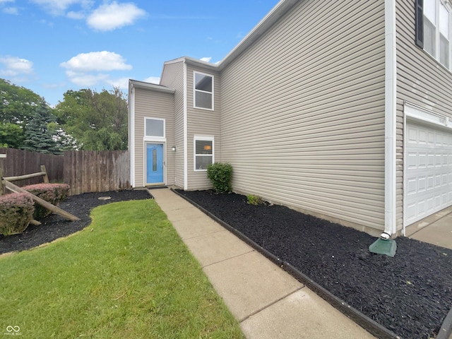 15110 Fawn Hollow Ln, Noblesville, IN 46060 - view of exterior entry with an attached garage