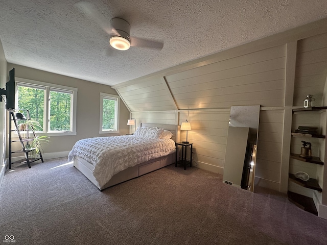 2034 Dubois Rd, Spencer, IN 47460 - carpeted bedroom with lofted ceiling, a textured ceiling, a ceiling fan, and baseboards