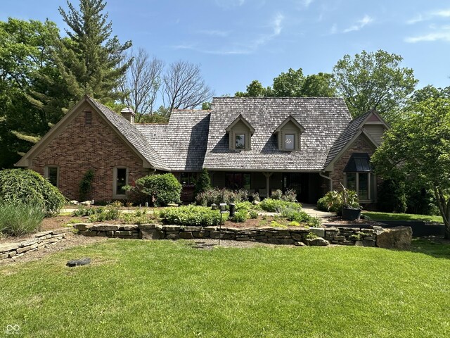 2034 Dubois Rd, Spencer, IN 47460 - view of front facade with a front lawn and brick siding