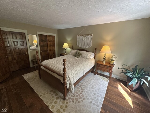 2034 Dubois Rd, Spencer, IN 47460 - bedroom featuring hardwood / wood-style floors, a textured ceiling, and baseboards