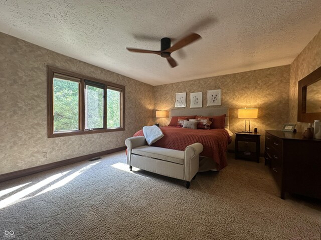 2034 Dubois Rd, Spencer, IN 47460 - bedroom featuring a textured ceiling, light carpet, and ceiling fan