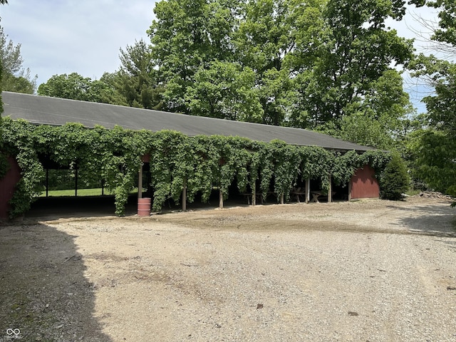 2034 Dubois Rd, Spencer, IN 47460 - view of car parking with a carport and dirt driveway