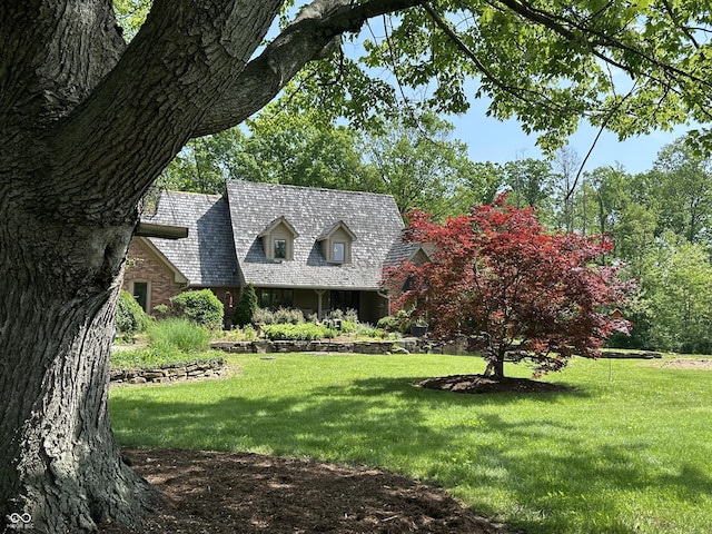 2034 Dubois Rd, Spencer, IN 47460 - new england style home featuring a front yard