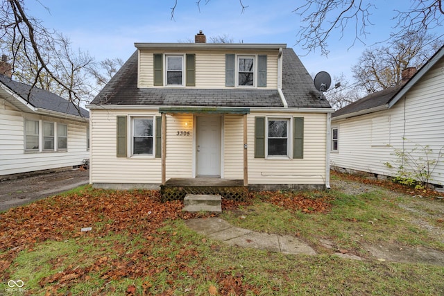 3305 N Arlington Ave, Indianapolis, IN 46218 - view of front facade with a chimney