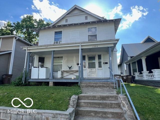 1304 Franklin St, Columbus, IN 47201 - traditional style home featuring covered porch and a front yard