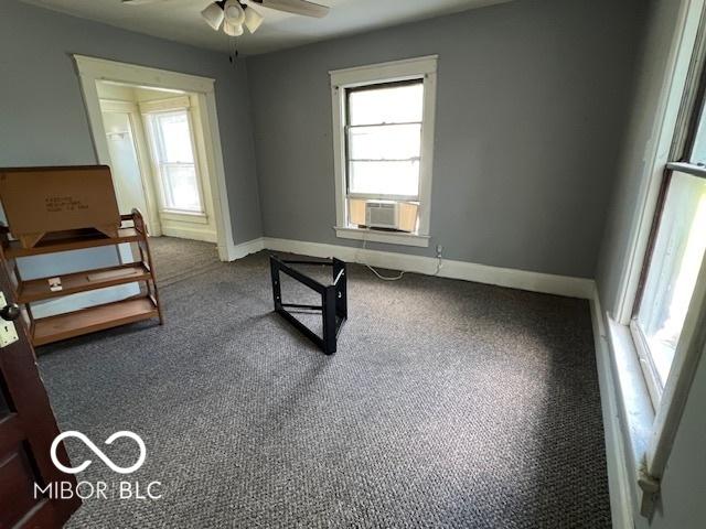 1304 Franklin St, Columbus, IN 47201 - unfurnished bedroom with cooling unit, carpet floors, and baseboards