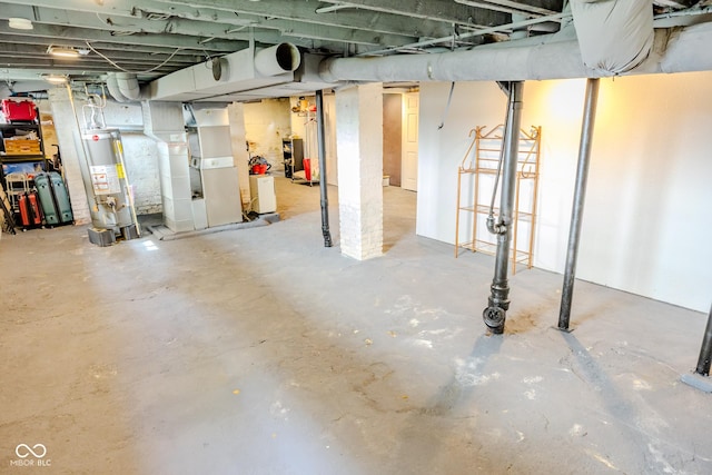 517 Bernard Ave, Indianapolis, IN 46208 - unfinished below grade area featuring water heater and heating unit