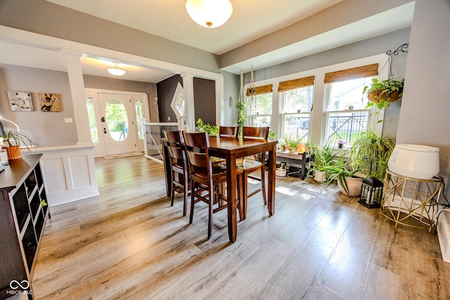 517 Bernard Ave, Indianapolis, IN 46208 - dining area with light wood finished floors and wainscoting