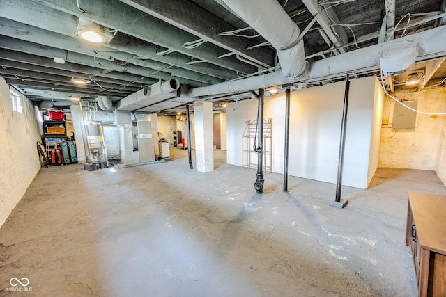 517 Bernard Ave, Indianapolis, IN 46208 - unfinished below grade area with water heater, heating unit, and electric panel