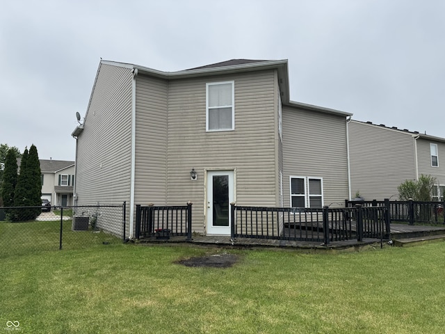 5502 Floating Leaf Dr, Indianapolis, IN 46237 - back of property with a wooden deck and central AC