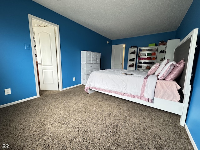 5502 Floating Leaf Dr, Indianapolis, IN 46237 - bedroom featuring a textured ceiling, carpet, and baseboards
