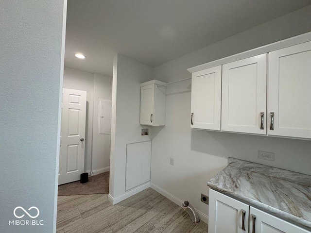 844 Ben Franklin St, Cloverdale, IN 46120 - washroom featuring cabinet space, washer hookup, recessed lighting, light wood-style floors, and baseboards