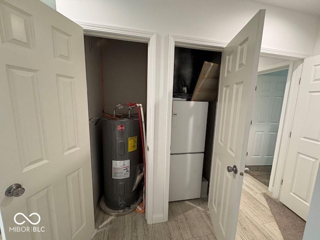 844 Ben Franklin St, Cloverdale, IN 46120 - utility room with electric water heater