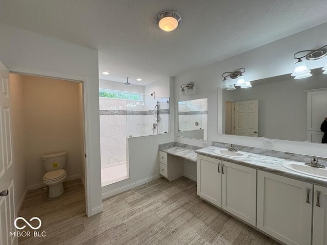 844 Ben Franklin St, Cloverdale, IN 46120 - full bath featuring double vanity, walk in shower, toilet, and wood finished floors