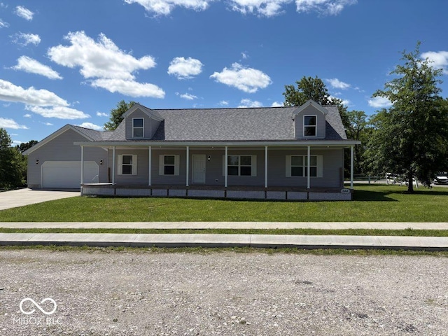 844 Ben Franklin St, Cloverdale, IN 46120 - country-style home with covered porch, driveway, an attached garage, and a front lawn