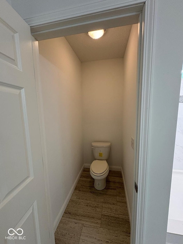 844 Ben Franklin St, Cloverdale, IN 46120 - bathroom featuring toilet and baseboards