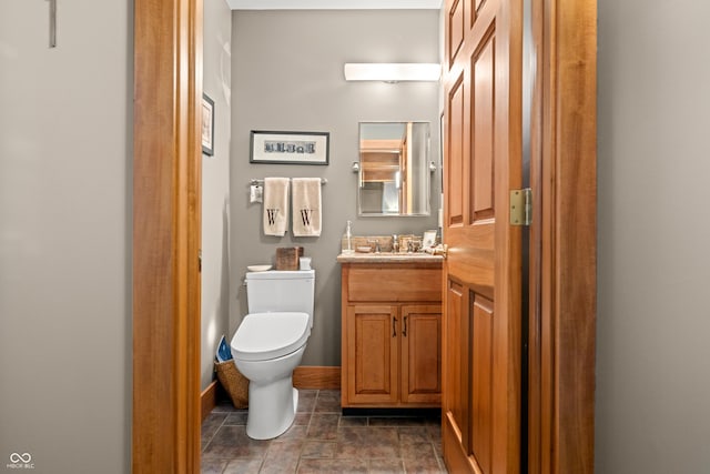 2369 Turning Tree Dr, Nashville, IN 47448 - bathroom with vanity, toilet, and baseboards