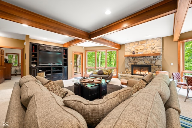 2369 Turning Tree Dr, Nashville, IN 47448 - living area featuring carpet floors, beam ceiling, and a stone fireplace
