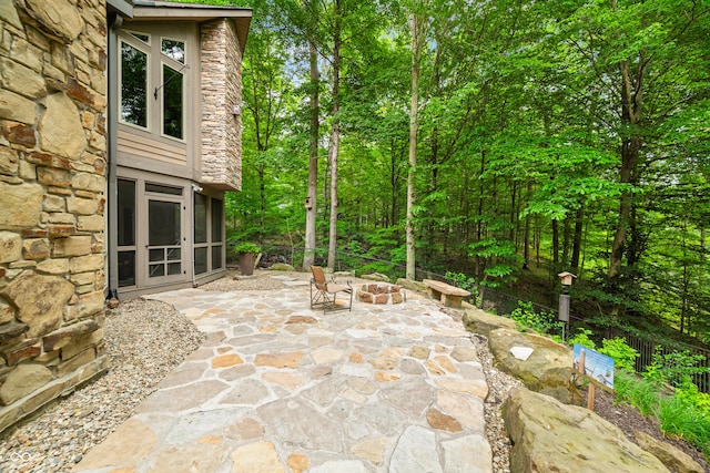 2369 Turning Tree Dr, Nashville, IN 47448 - view of patio featuring a fire pit