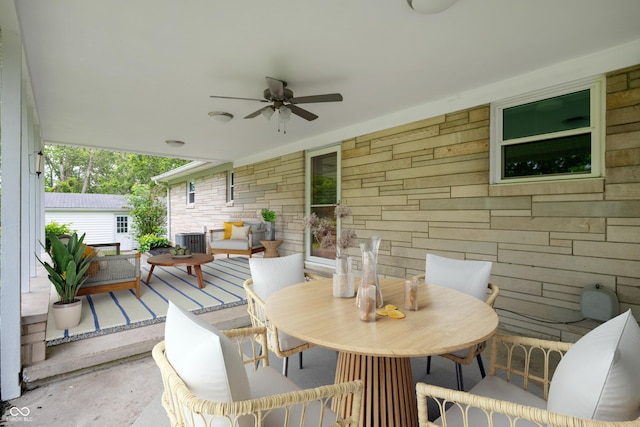 7482 W US Highway 40, Indianapolis, IN 46229 - view of patio featuring ceiling fan, central AC unit, outdoor dining space, and an outdoor hangout area