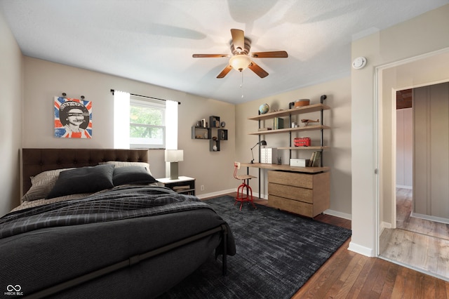 7482 W US Highway 40, Indianapolis, IN 46229 - bedroom featuring wood finished floors, baseboards, and a ceiling fan