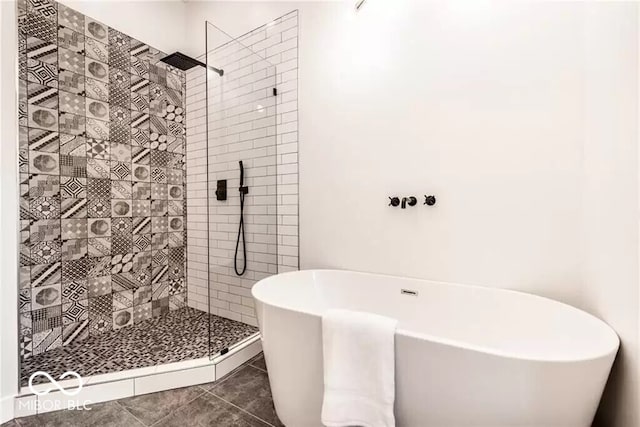 918 S State Ave, Indianapolis, IN 46203 - full bath with walk in shower, a freestanding bath, and tile patterned floors
