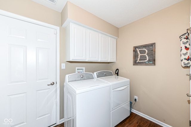 11692 Seven Oaks Dr, Fishers, IN 46038 - laundry area with baseboards, washer and dryer, cabinet space, and dark wood-style floors