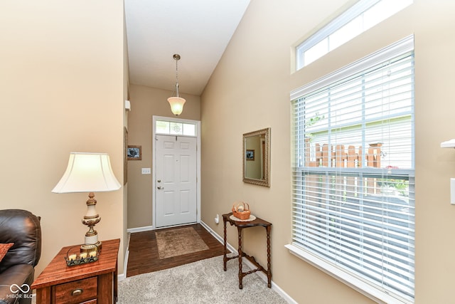 11692 Seven Oaks Dr, Fishers, IN 46038 - carpeted entryway featuring baseboards and a high ceiling