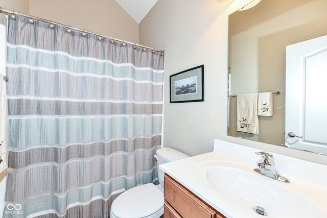 11692 Seven Oaks Dr, Fishers, IN 46038 - bathroom featuring vanity, toilet, vaulted ceiling, and a shower with curtain
