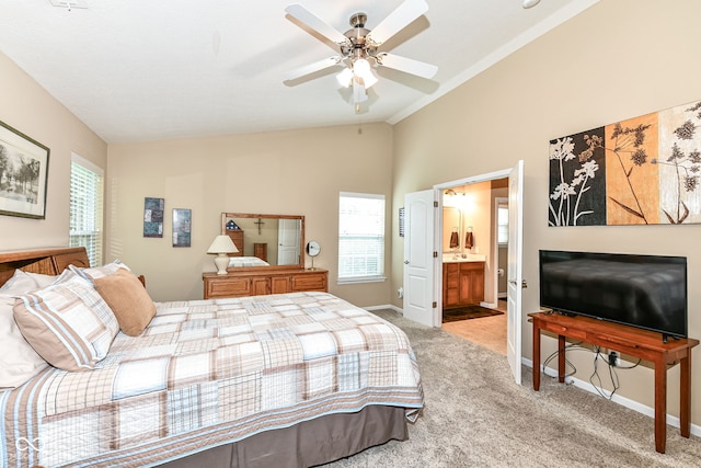 11692 Seven Oaks Dr, Fishers, IN 46038 - carpeted bedroom with lofted ceiling, baseboards, ensuite bathroom, and a ceiling fan