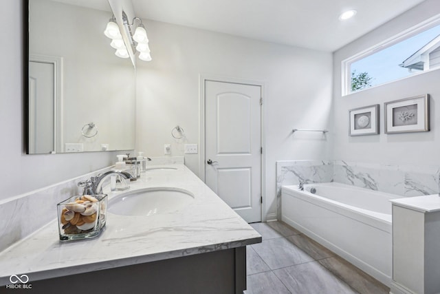 14458 Carlow Run, Carmel, IN 46074 - bathroom with double vanity and a bath